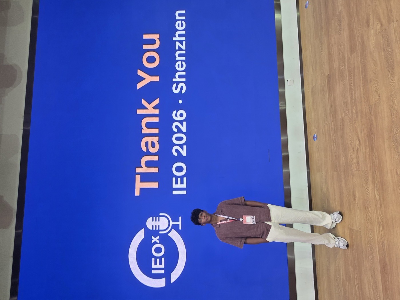Shashank standing in front of the IEO 2026 Shenzhen closing screen, which reads Thank You
